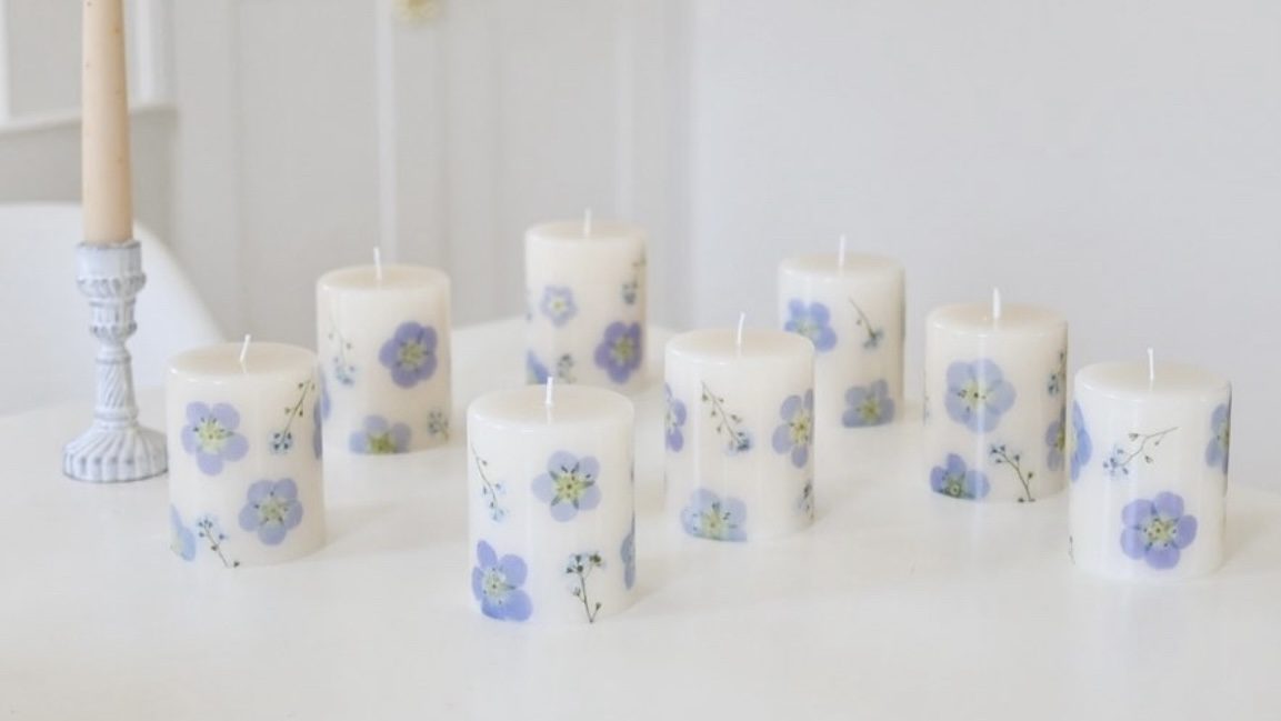 ROCA candles with pressed blue flowers