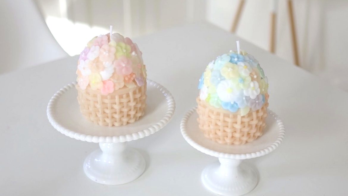 Delicate flower-basket candles by ROCA